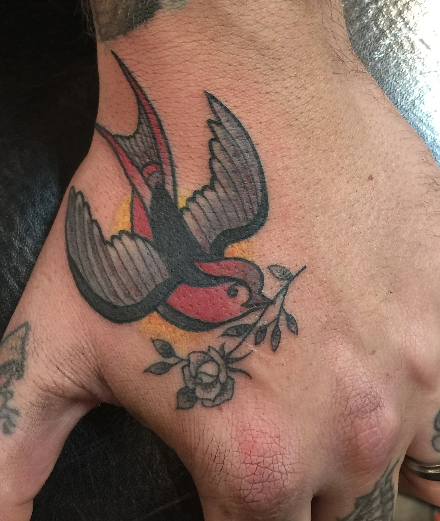 Bird tattoo by Jeremy Swan
