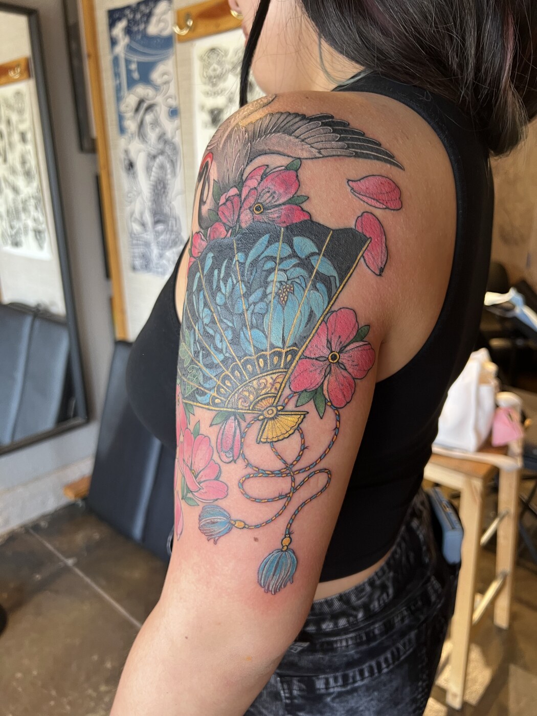 Japanese folding fan, crane and cherry blossom cover-up tattoo by Broken Art Tattoo, Los Angeles